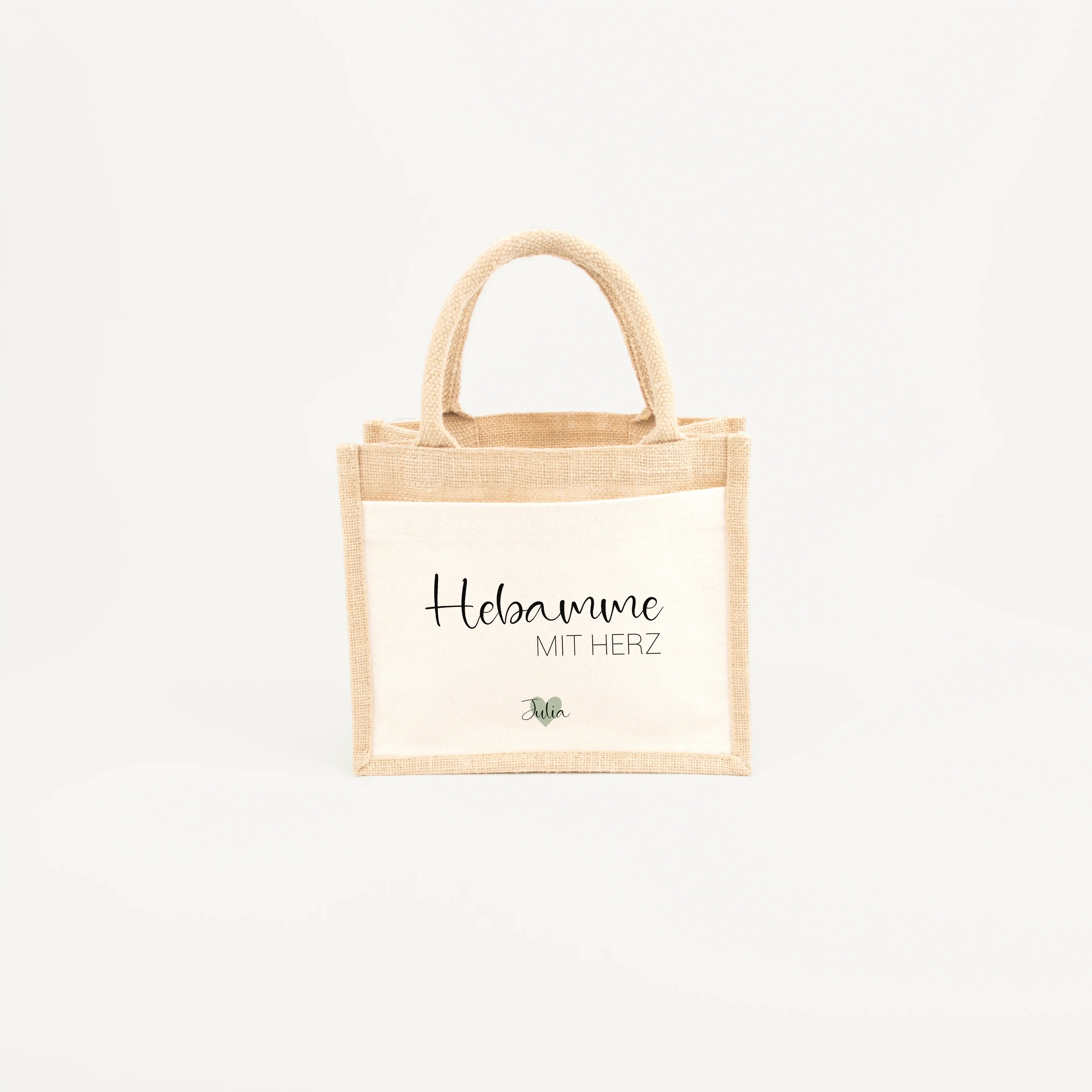 Jutetasche Hebamme mit Herz - Jutetasche - famprints - Du suchst ein persönliches Geschenk für deine Hebamme? Unsere Jutetasche Hebamme mit Herz ist das perfekte Dankeschön für die liebevolle Unterstützung von der Schwangerschaft bis zur Geburt. Auf der T