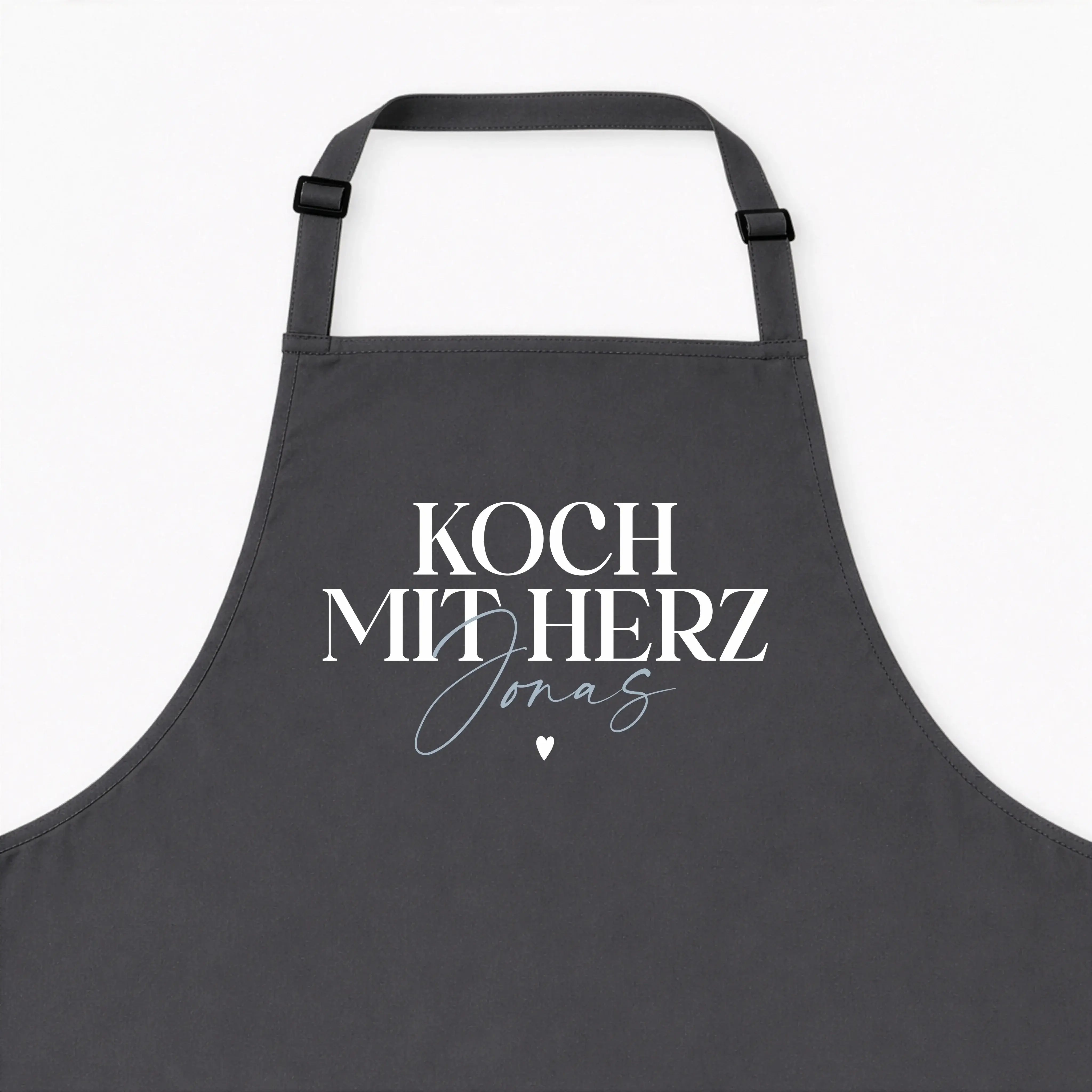 Kochschürze Koch mit Herz-Kochschürze-famprints-Kochschürze Koch mit Herz steht für Freude am Kochen und für eine persönliche Note, die man sofort sieht. Bei famprints wird aus einer hochwertigen Küchenschürze ein individuelles Geschenk, das genau zu dir