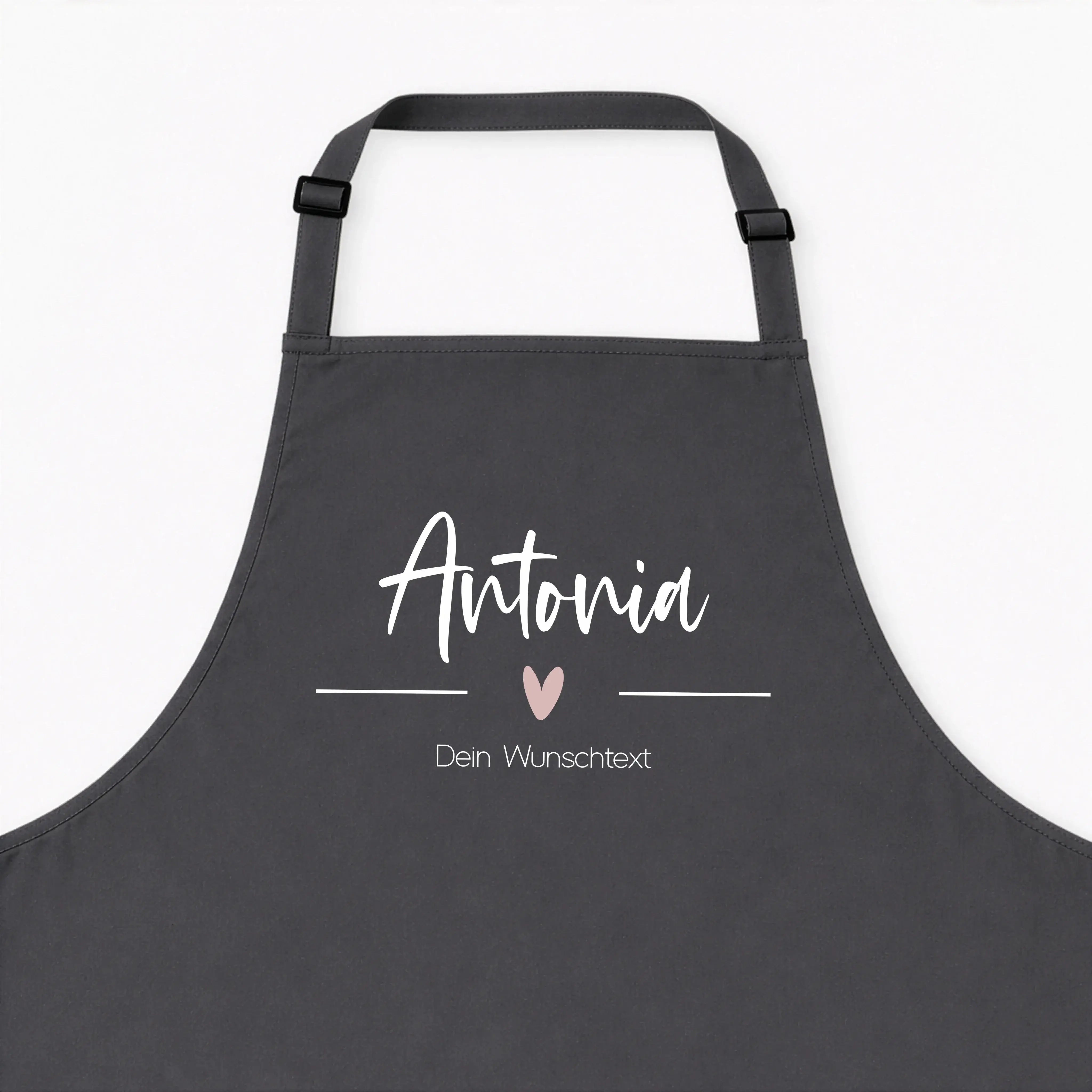 Kochschürze Text + Symbol-Kochschürze-famprints-Kochschürze Text + Symbol wird bei famprints zu einem persönlichen Küchenbegleiter, der genau zeigt, wer hier kocht, backt oder grillt. Du gestaltest deine Schürze mit Namen, Wunschtext und einem passenden S
