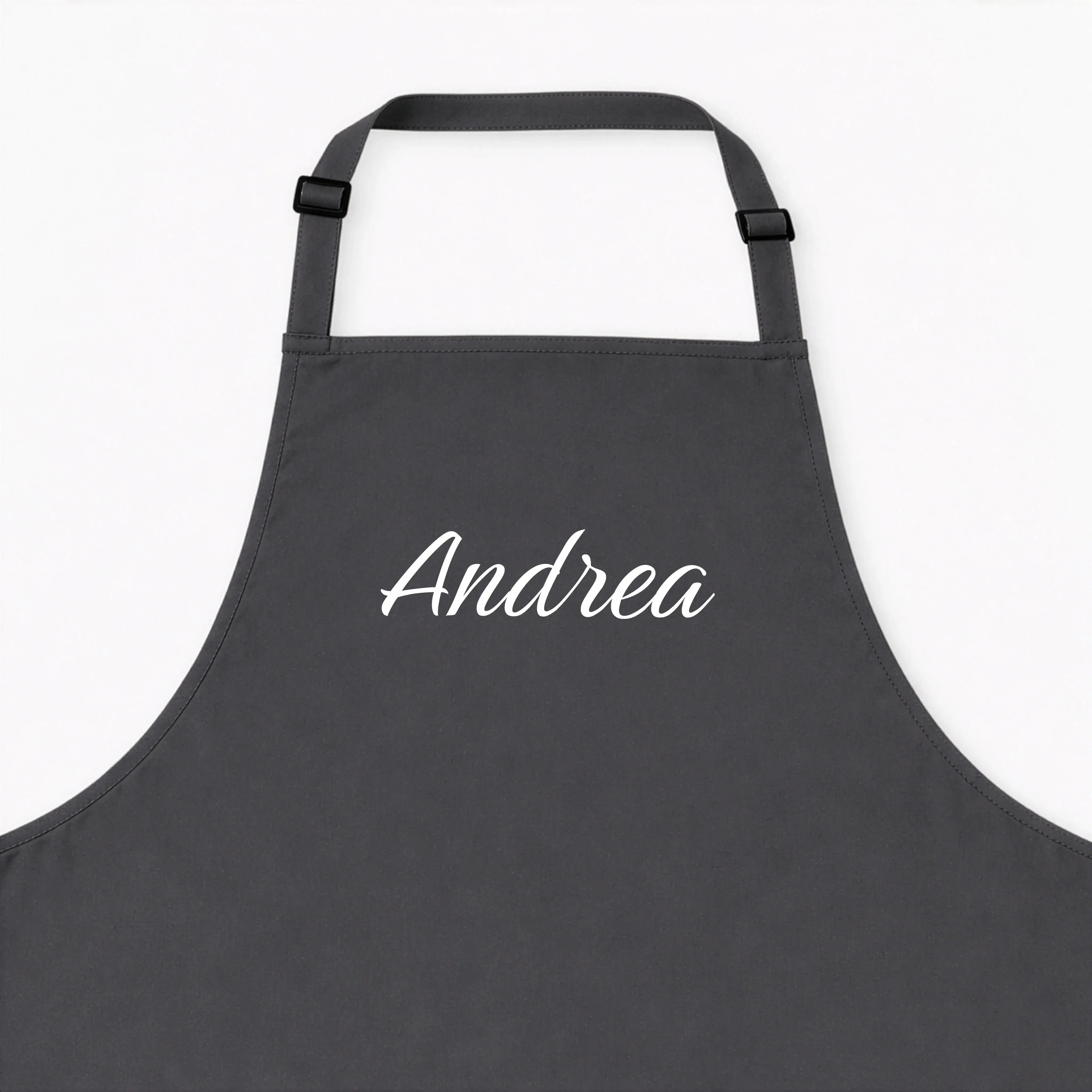 Kochschürze mit Namen-Kochschürze-famprints-Eine Kochschürze mit Namen macht aus jedem Kochmoment etwas Persönliches. Bei famprints gestaltest du deine personalisierte Kochschürze genau so, wie sie zu dir oder zur beschenkten Person passt. Ob dezente Schr