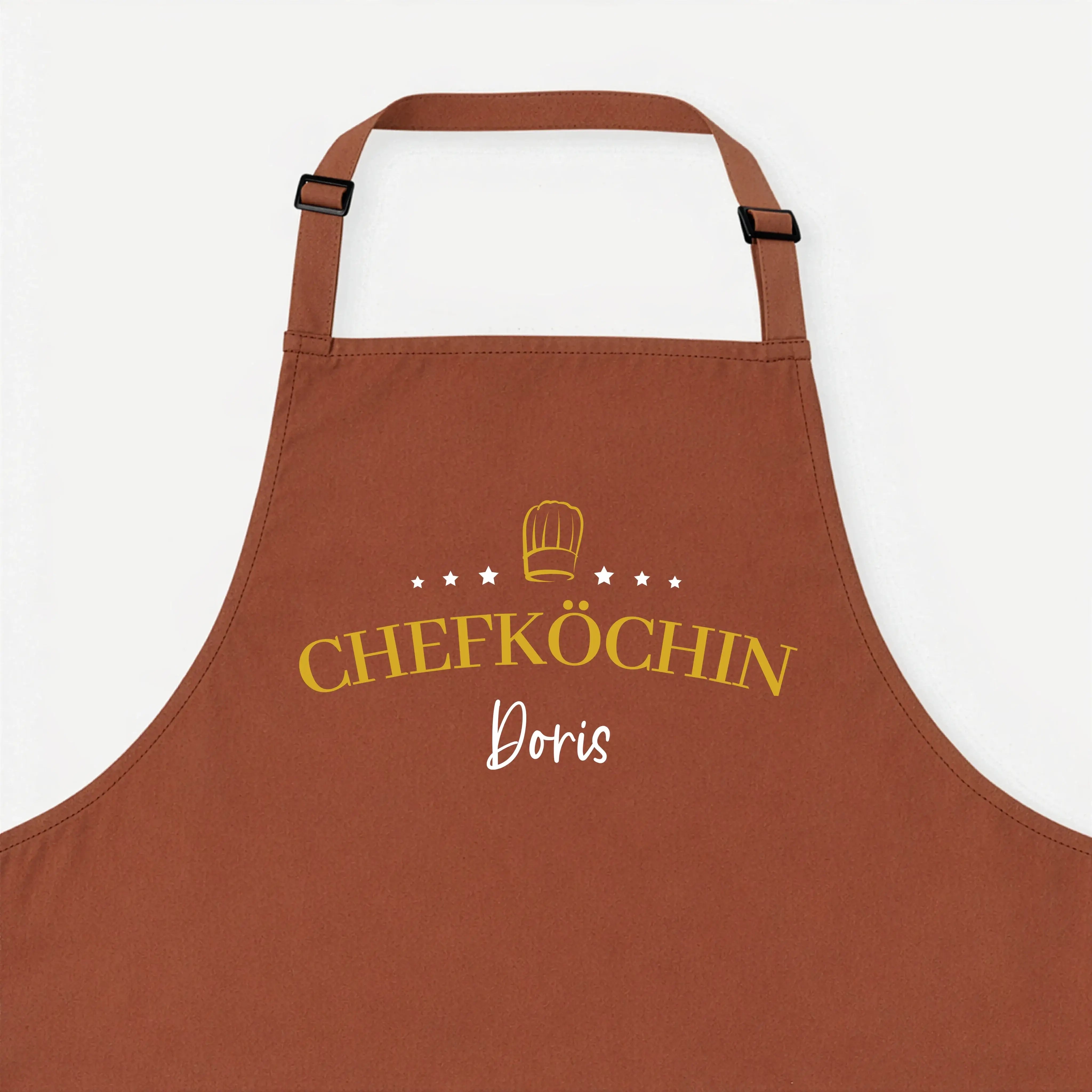 Kochschürze Chefköchin Sterne-Kochschürze-famprints-Diese Kochschürze Chefköchin Sterne ist mehr als ein praktisches Küchenaccessoire. Sie macht aus jedem Kochmoment ein persönliches Statement. Das Design kombiniert den eleganten Schriftzug Chefköchin mit