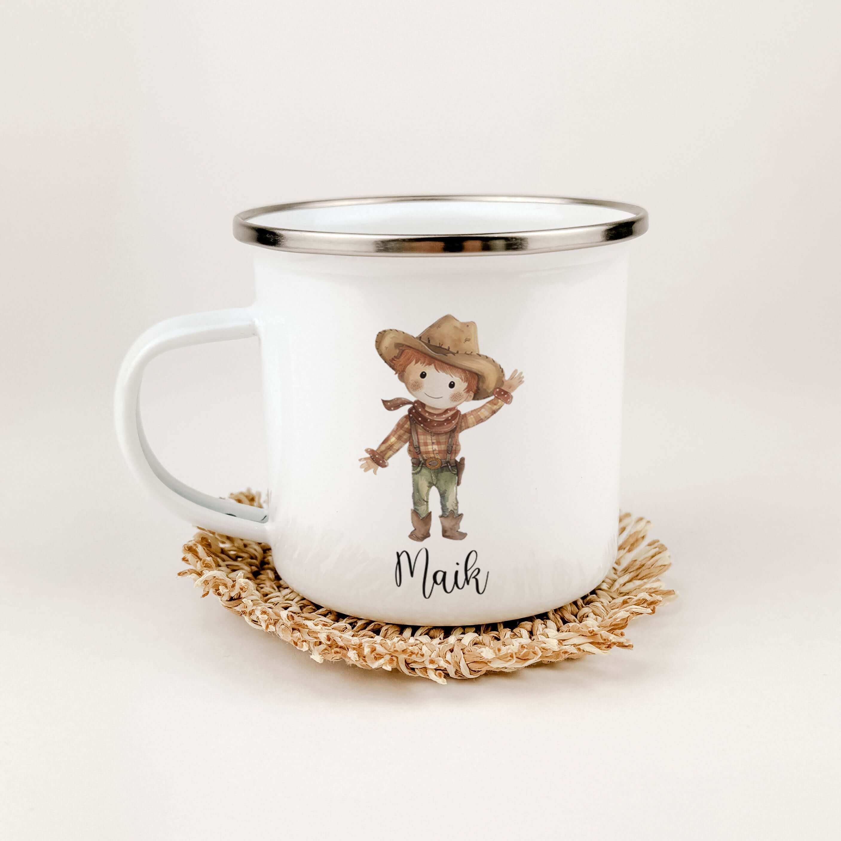 Emaille Tasse Cowboy-famprints-Emaille Tasse-Mit ihrem liebevoll gestalteten süßen Cowboy in Aquarell Optik ist diese Tasse nicht nur ein echter Hingucker, sondern auch ein perfektes Geschenk für Kinder zur Einschulung, Taufe oder Ostern. Der brillante un