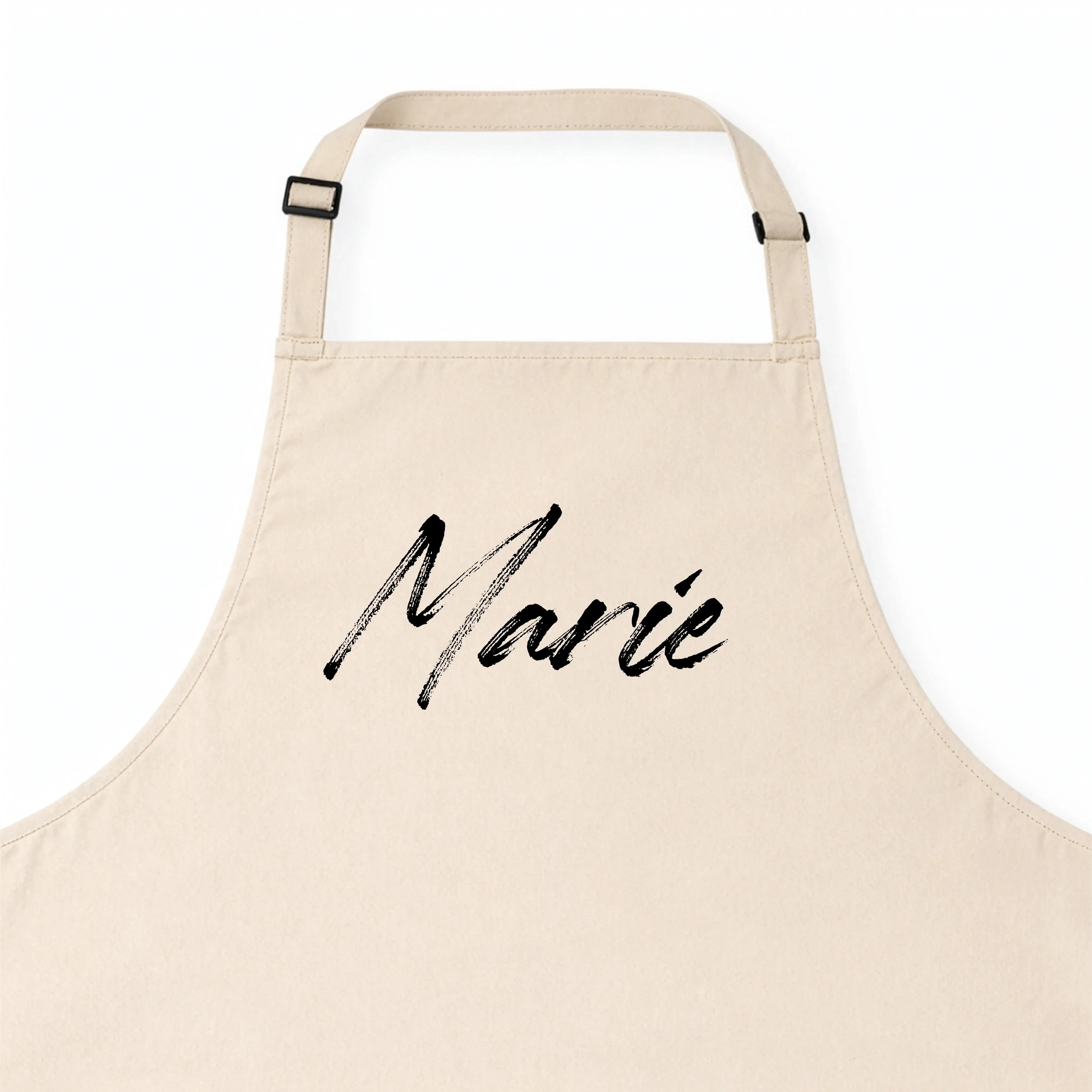 Kochschürze mit Namen-Kochschürze-famprints-Eine Kochschürze mit Namen macht aus jedem Kochmoment etwas Persönliches. Bei famprints gestaltest du deine personalisierte Kochschürze genau so, wie sie zu dir oder zur beschenkten Person passt. Ob dezente Schr